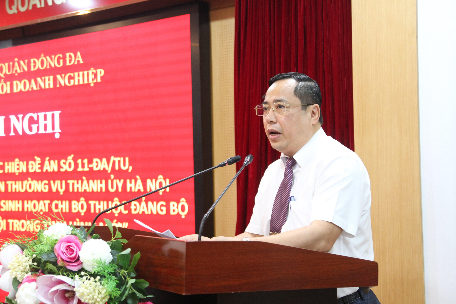 Đồng chí Nguyễn Văn Quang - Phó Bí thư, Chủ nhiệm Uỷ ban Kiểm tra Đảng bộ Khối Doanh nghiệp quận Đống Đa phát biểu tại hội nghị.
