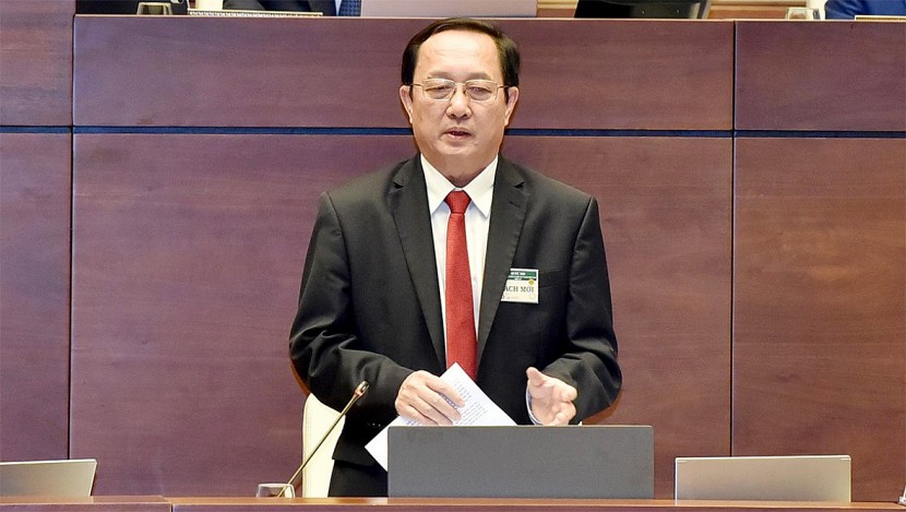 Bộ trưởng Bộ Khoa học và Công nghệ Huỳnh Thành Đạt trả lời chất vấn tại hội trường. Ảnh: Lâm Hiển