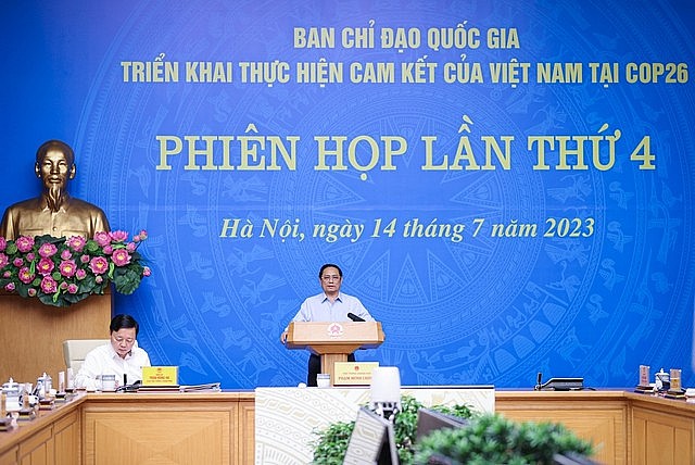 Thủ tướng yêu cầu Ban Chỉ đạo và các cấp, các ngành tiếp tục đẩy nhanh tiến độ thực hiện các nhiệm vụ triển khai thực hiện các cam kết của Việt Nam tại COP26 - Ảnh: VGP/Nhật Bắc