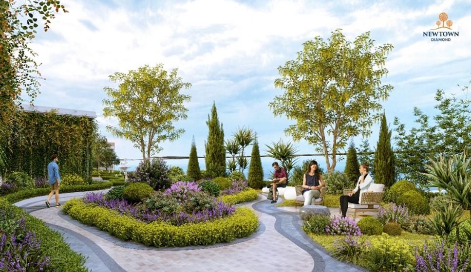 Không gian nghỉ dưỡng không chỉ hiện hữu trong nhà mà còn bao trùm từng bước chân của chủ nhân căn hộ tại Newtown Diamond. Bước ra ngoài căn hộ, loạt tiện ích cao cấp như vườn trên cao, skybar, trung tâm thương mại, bể bơi, phòng gym, spa, sân chơi… có thiết kế giao hòa với thiên nhiên sẽ đem lại không gian sống an lành và đầy tiện nghi, biến mỗi khoảnh khắc ở nhà thành khoảng thời gian nghỉ dưỡng tuyệt vời.